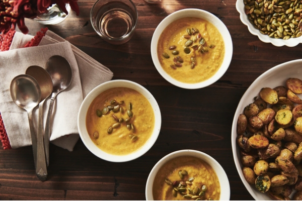 Image of roast potatoes and butternut squash soup on a table
