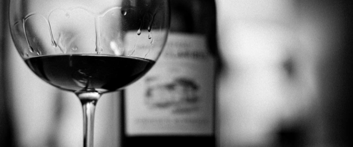 Elegant Black and White Wine Glass and Bottle