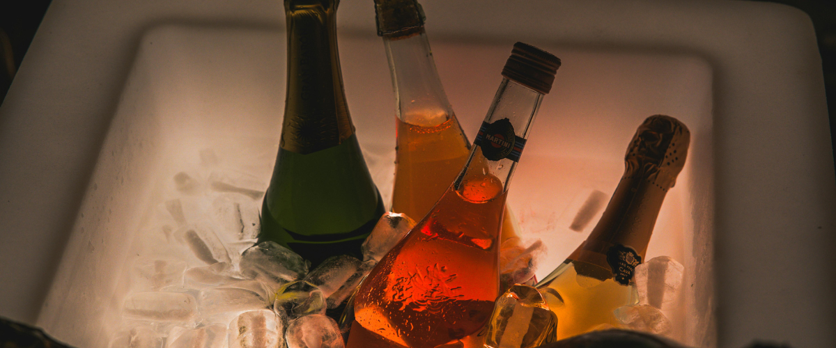 several bottles of wine in ice and water