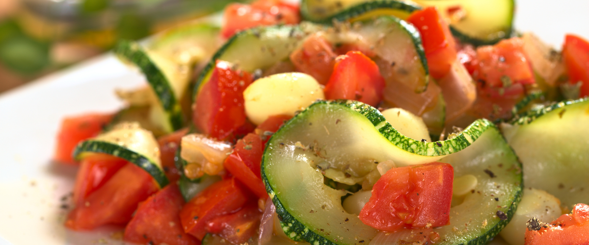 cooked tomatoes and zucchini