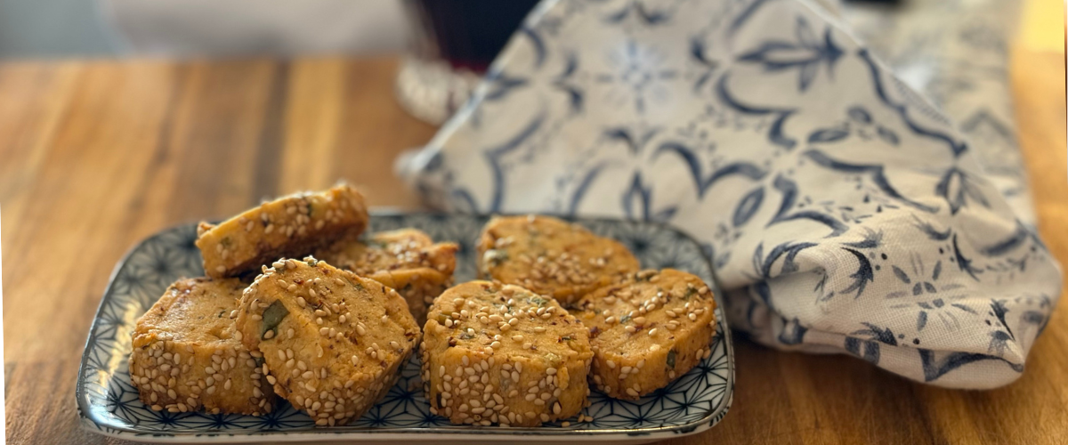 chili crisp crackers on a blue a white plate