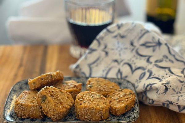 chili crisp crackers on a blue a white plate