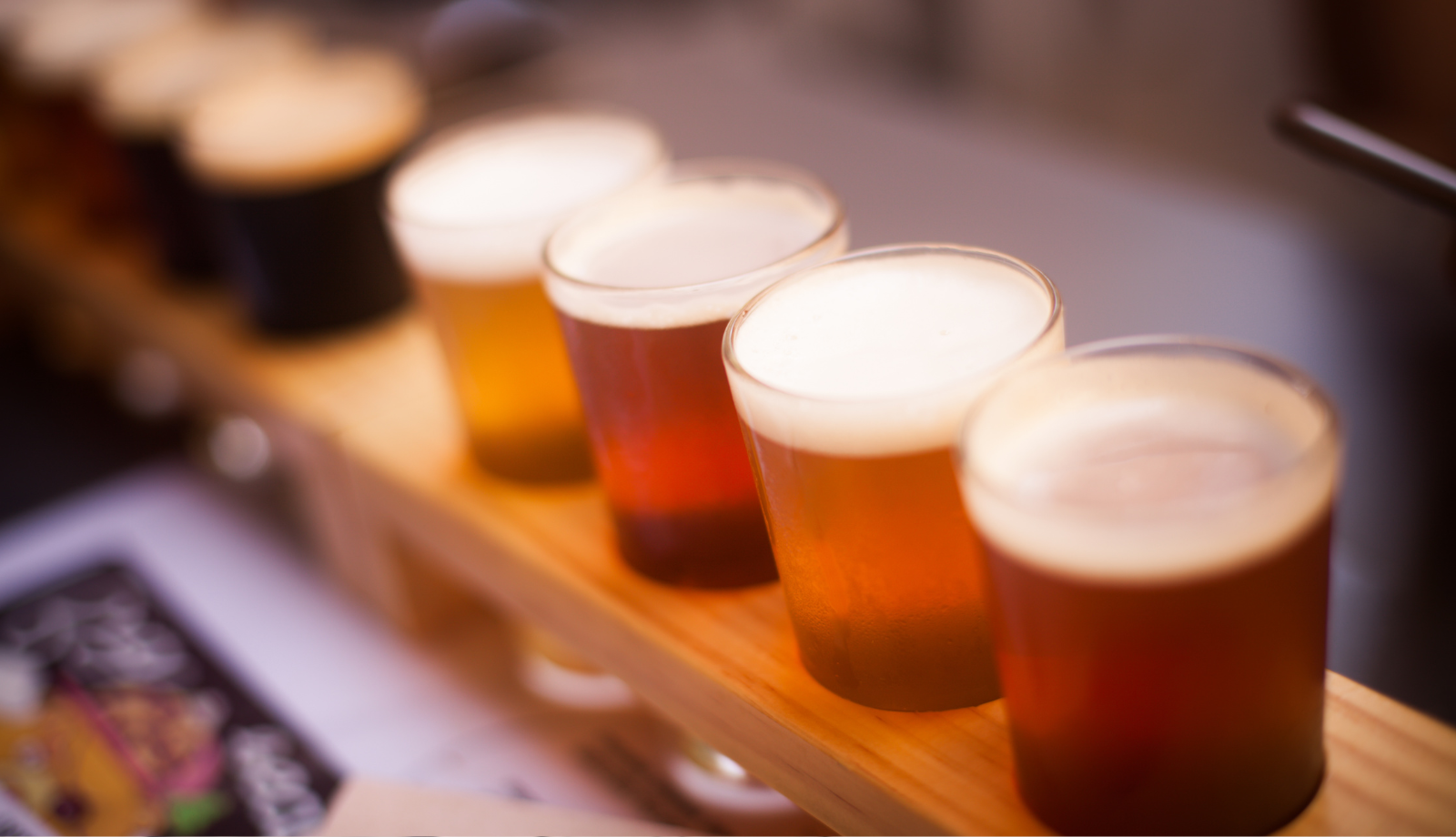 craft beer samples lined up in a row